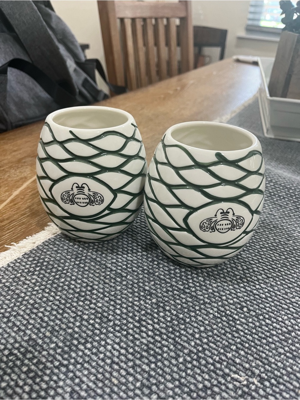White Ceramic Patron Cups with Dark Green Wave Detail - Set of 2